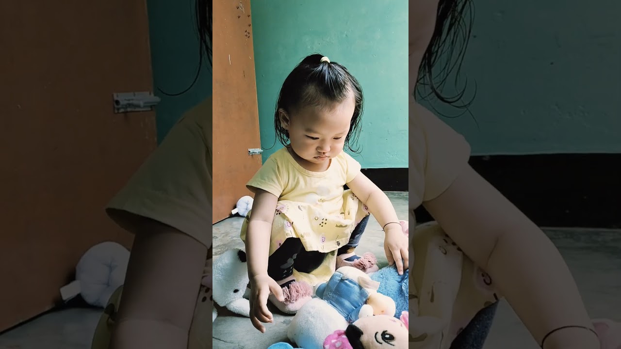 Avu baby playing with her toys