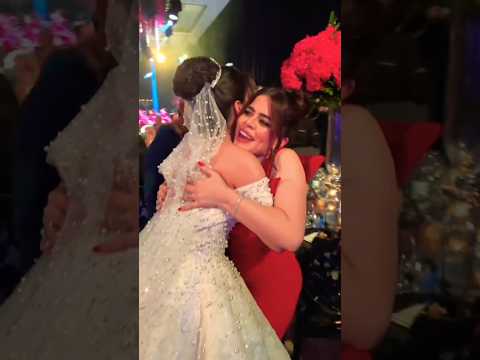 اجمل اثنين اشرقت تحضن ساندي جمال بحفل زفافها