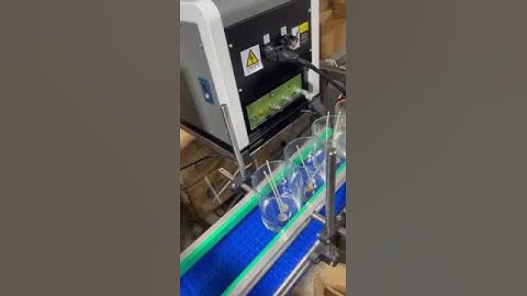 Automatic wick inserting machine for candle making