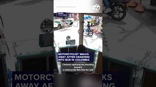 Motorcyclist walks away after crashing into bus in Colombia