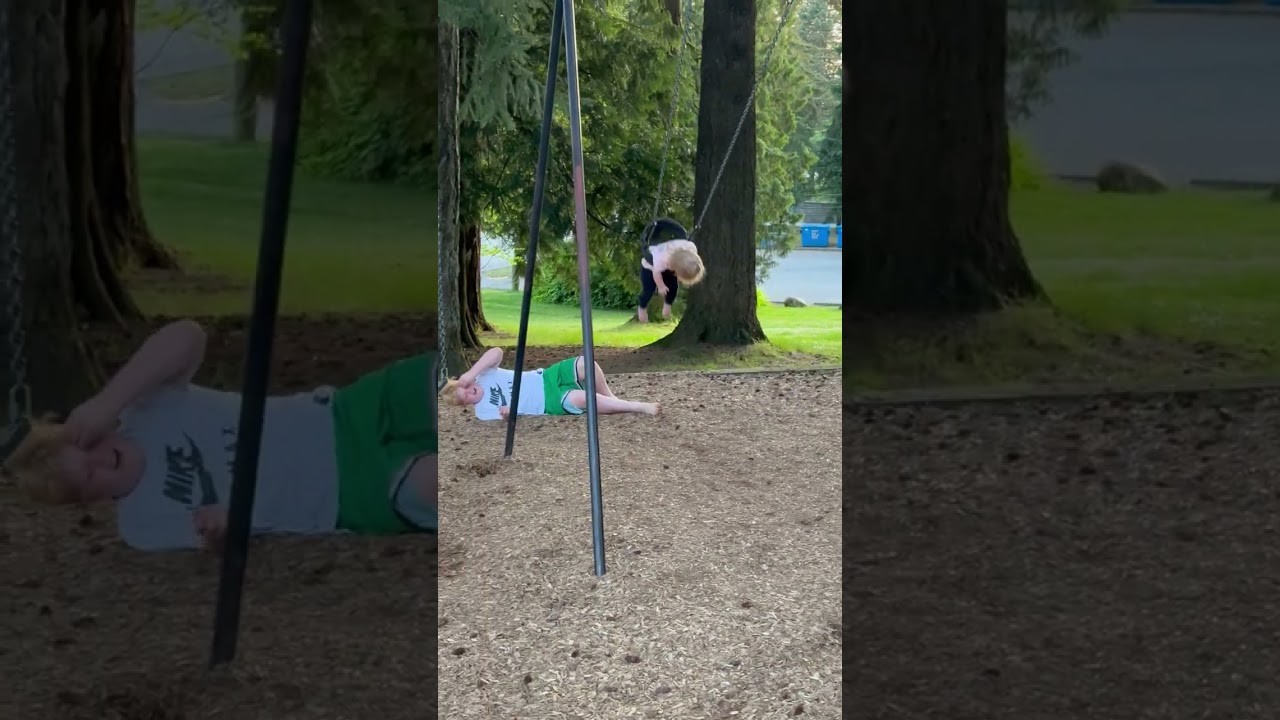 Boy pushes little girl on swings at playground and gets kicked on the head