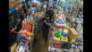 Surveillance Video of Arrest in Corner Store (provided)