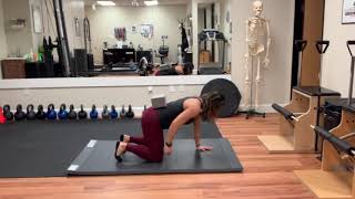 Shoulder taps in bear or beast position