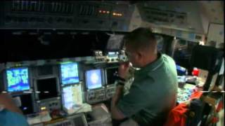 Discovery Crew Inspects Orbiter