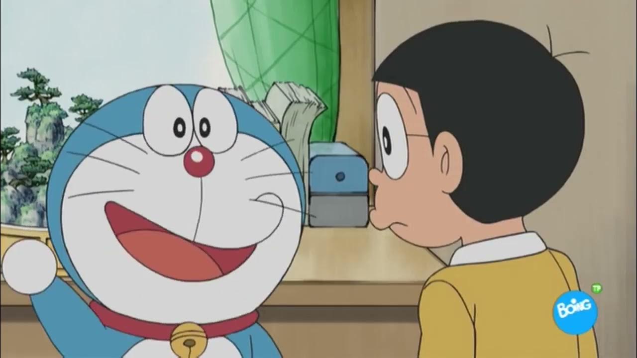Doraemon Buscando setas en un paisaje en miniatura (Español