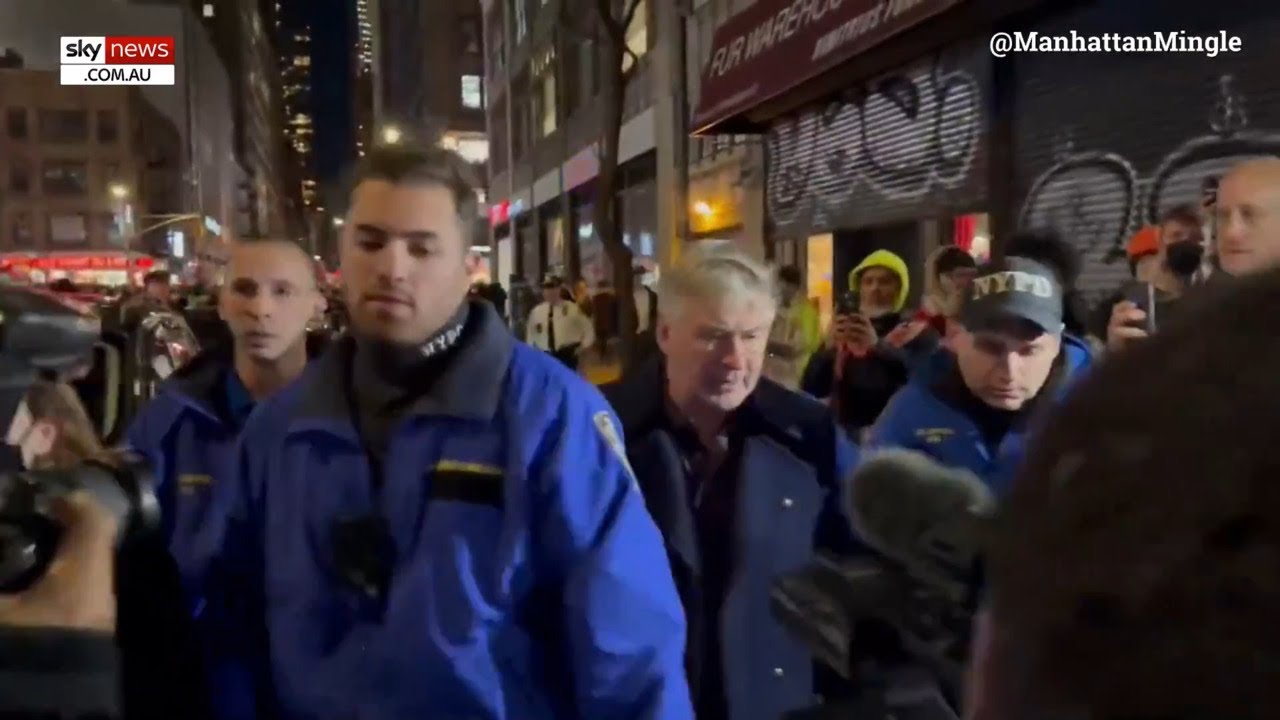 Alec Baldwin escorted by police after heated confrontation at pro ...