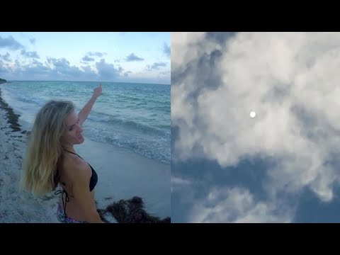 Strange Illuminated Spherical UFO Object Filmed Below Clouds over North Carolina's Coastline
