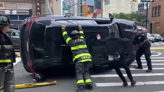 SUV Lands on Car in Midtown, Then Crushes NYC Firefighter