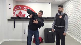 How to put on a ballistic (bullet proof) vest. Canada Guard Security Training
