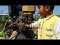 Kid repairing the field diesel engine / KID repair pitar engine /KID play with Pitar engine