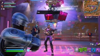 Fortnite: Battle Royale: C5S3 Trios Multiplayer 1 (Bot Lobby)
A full Zero-Build Trios Battle Royale round in Fortnite by Epic Games for the Microsoft XBox One.
Robocop (MacDaddyNook) and Kiara K.O. (MinionMancer) team up to take on 33 other AI player teams to be the last team standing during the Chapter 5 Season 3 period. Fortnite: Battle Royale: C5S3 Trios Multiplayer 1 (Bot Lobby)