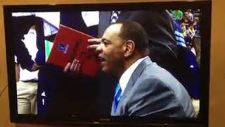 Bryan S. Harris with his famous court side seats at The Grizzlies with Coach Lionel Collins