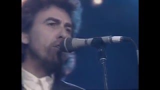 George Harrison and Eric Clapton While my guitar gently weeps