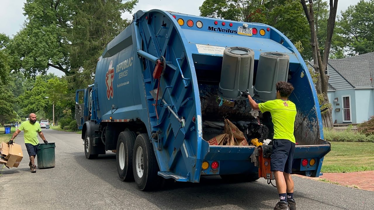 Republic Services Garbage Truck Flying Through Manual Trash
