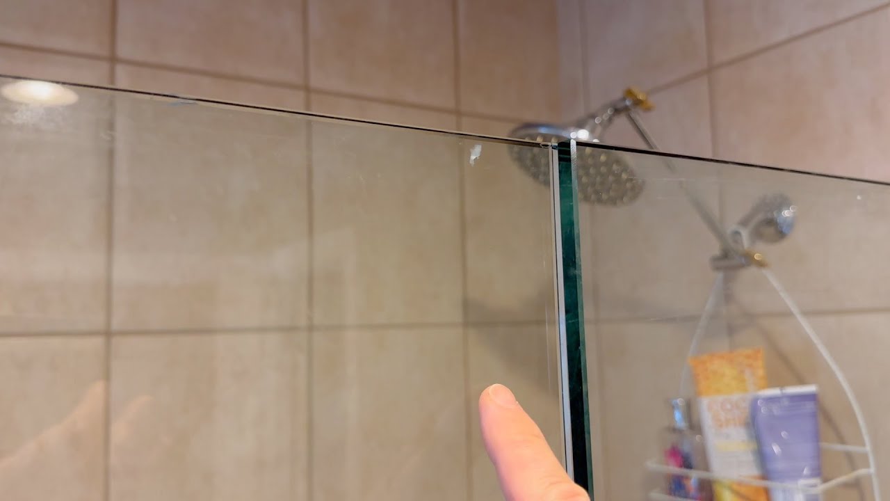 Glass shower door rubbing. How do I move the gap back? When hot water hits  it it expands a bit and rubs and worries it might shatter. : r/howto