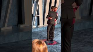 Shawn Mendes and Andrew Garfield hugging at the Vanity Fair #Oscars party