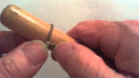 Tying in a stock on a bagpipe