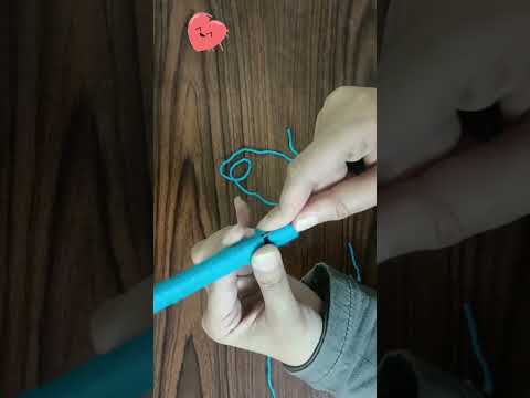 عمل وردة من خيط الصوف