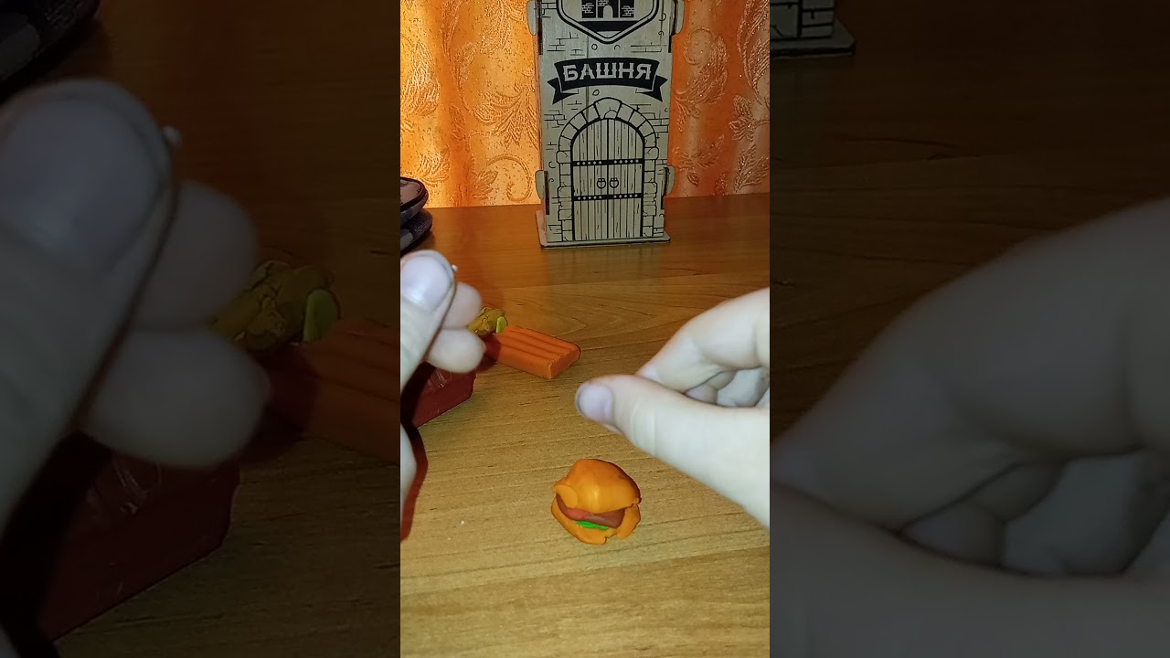 is he eating a plasticine hamburger ??? YouTube