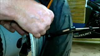 Replacing a Motorcycle tyre valve without removing the wheel from the bike