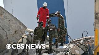 Emergency crews in Colombia desperately search for earthquake survivors