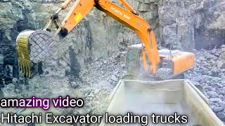 Hitachi Zaxis 220LC Excavator LoadingMMCTrucks Operator