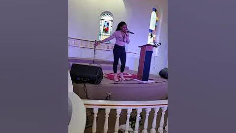 Kimberly Edmonds-Best singing at Impact Church