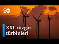 Bulutlara ulaşan dev rüzgâr türbinleri: Almanya’da enerji geçişi "dinozorlara" bağlı - DW Türkçe