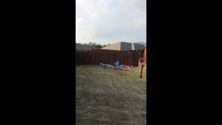 Girl pushes Hot Wheels car up track then slips and car hits her on face
