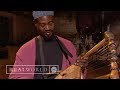 Ayub Ogada demonstrates a Nyatiti (African instrument)