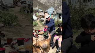 Brewing Samavar Tea And Mountain Flowers Outdoors?