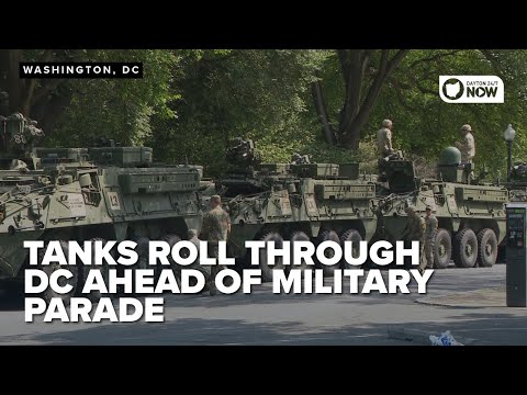 Military vehicles roll
