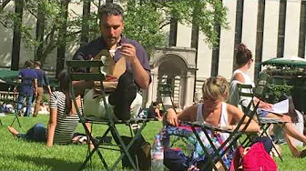 Tourist Wiggles Toes In Dress Socks