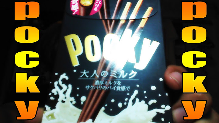 Probando los "Pocky" sabor leche de chocolate y textura de pay.