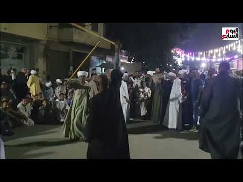 الصعايدة يرقصون بالعصا فى الليلة الختامية لذكرى استقرار رأس الحسين