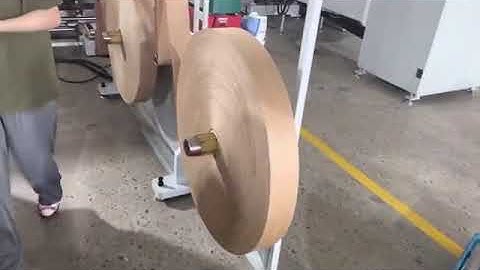 Fully automatic paper bag making machine with twisted rope handle
