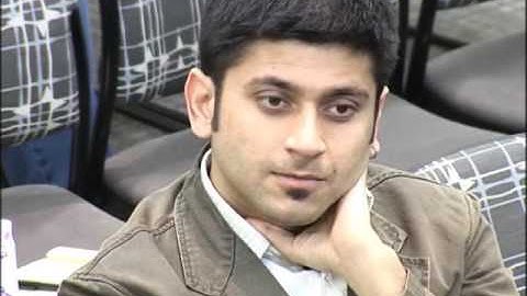 A First Look at a Commercial Hybrid Content Delivery System