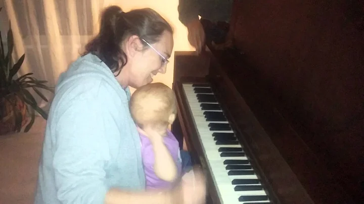 Shelby playing the piano