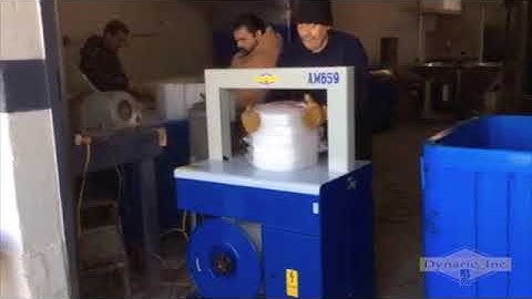 Dynaric AM659 Automatic Strapper Strapping Dry Ice | ProPac.com