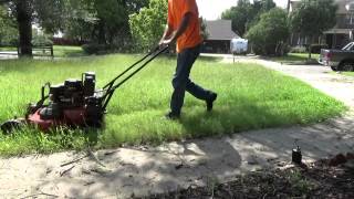 Mowing a tall yard.