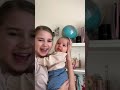 Sister singing for her newborn baby brother