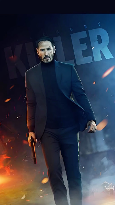 Why does John Wick make that quick hand gesture after reloading his pistol? #movies #johnwick