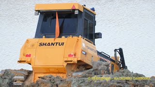 SHANTUI DH17C2 Pushing Soil With Hyundai Dump Truck Unloading Soil