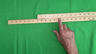 Using a pair of yardsticks to show addition