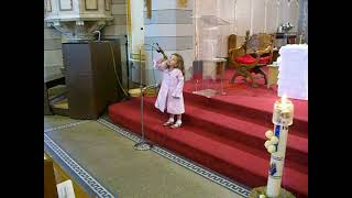 Annalisa Baptism Bella on alter with microphone