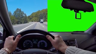 За рулем автомобиля на зеленом фоне. Футаж  на зеленом фоне. Хромакей. Full HD 1080р. Green screen.