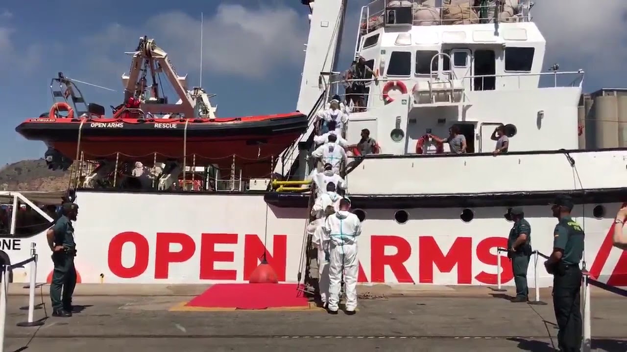 Open Arms Rescue Boat Docks in Barcelona With 59 Migrants on Board ...