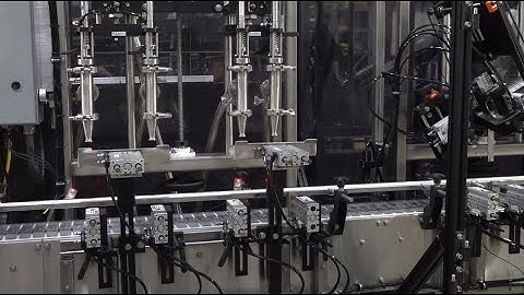 Automatic Paint Can Filler, Lid Placement, and Pressing System | InlinePack Turnkey Packaging Line