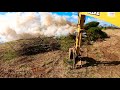 Clearing and Burning Cedar Trees so Farmer Chris can reclaim Field