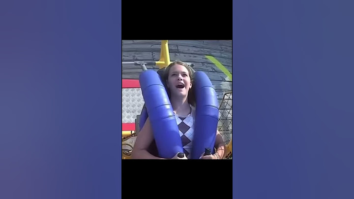 Girl Gets hit in the face With bird in Slingshot Ride